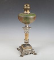 An early 20th century French white metal and marble mounted oil lamp with foliate painted glass