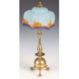 A late 19th/early 20th century Arts and Crafts brass table lamp, in the manner of W.A.S. Benson, the