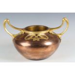 An early 20th century Continental Art Nouveau copper and gilt metal mounted twin-handled vase, width