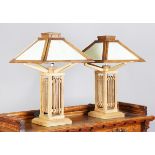 A pair of modern American Mission style oak framed table lamps, the angular square section shades