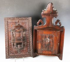 A 19th century Middle Eastern carved walnut panel, centred with an architectural niche with domed