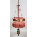 An early 20th century Arts and Crafts style anodized copper rise-and-fall ceiling light, the pierced