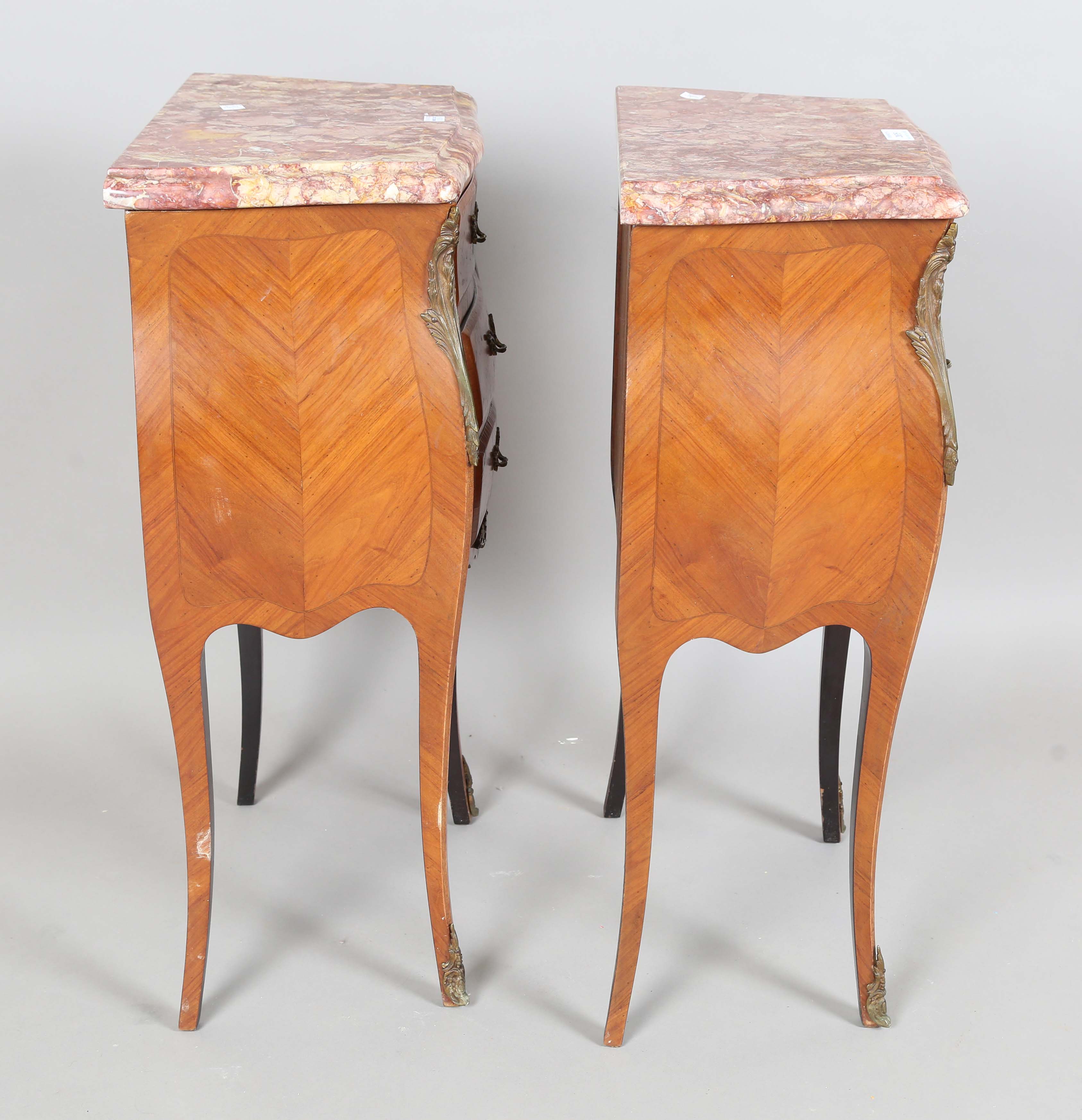 A pair of 20th century French kingwood marble-topped bedside chests with applied gilt metal - Image 4 of 7