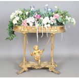A Victorian giltwood and gesso planter, the curve-ended trough fitted with a tin liner, the base