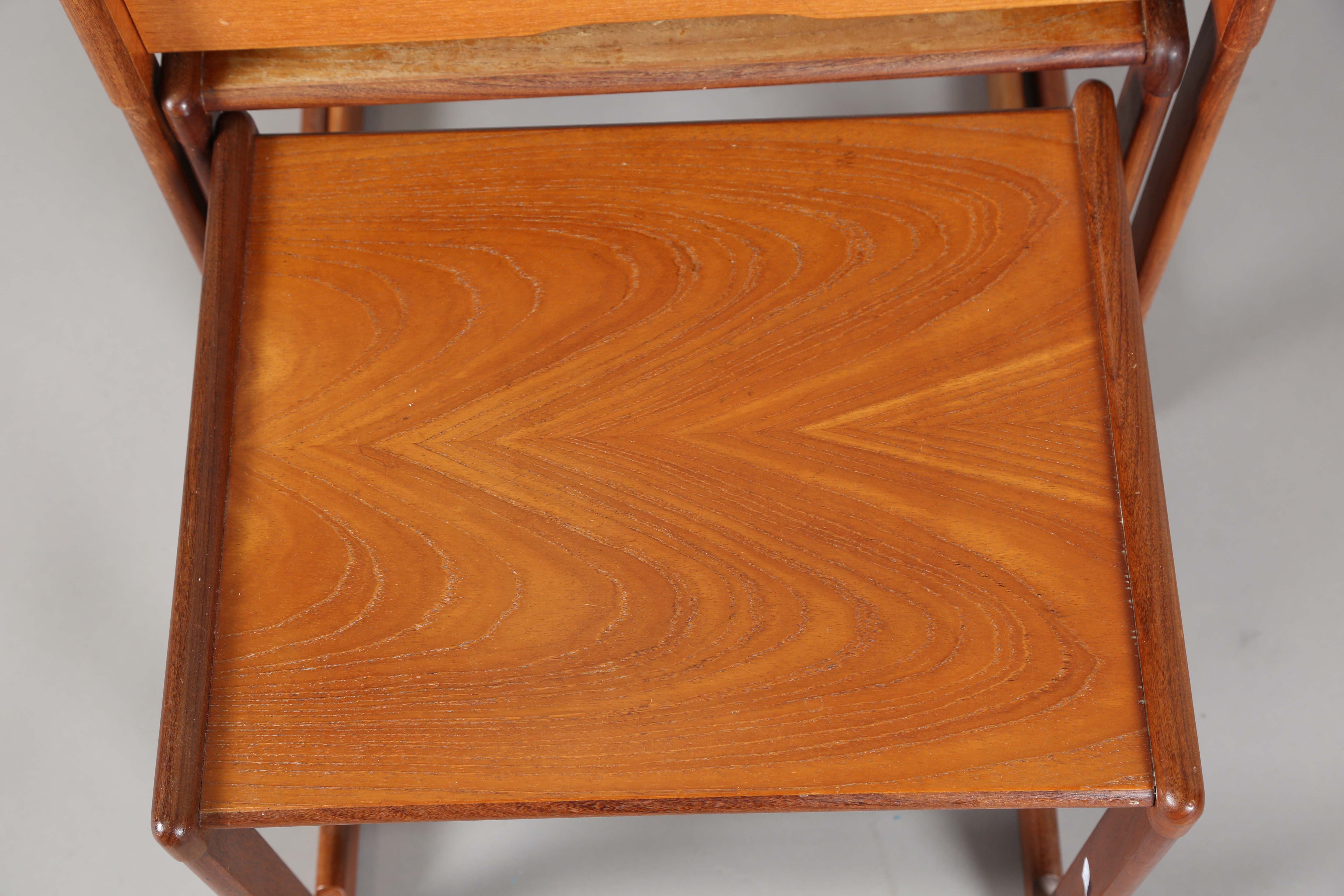 A mid-20th century G-Plan teak nest of three occasional tables, the top table fitted with a tiled - Image 4 of 6