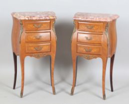 A pair of 20th century French kingwood marble-topped bedside chests with applied gilt metal