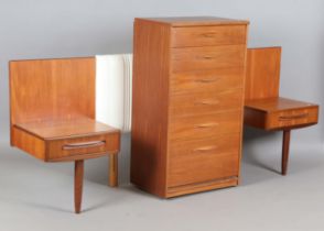 A mid-20th century Austinsuite teak dressing table of retro design, height 121cm, width 169cm, depth