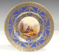 A Royal Worcester cabinet plate, dated 1929, painted by Jas Stinton, signed, with a titled scene