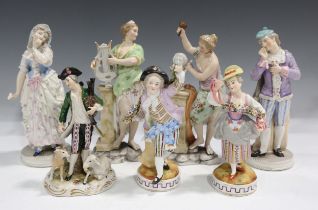 A pair of Sitzendorf porcelain figures, late 19th century, modelled as a standing male and female on