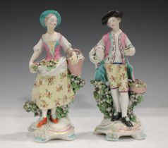 A pair of Derby porcelain figures, late 18th century, modelled as a shepherd with a lamb under his