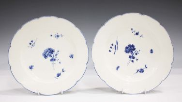 A pair of Chantilly porcelain plates, circa 1780, painted in blue with a central carnation within