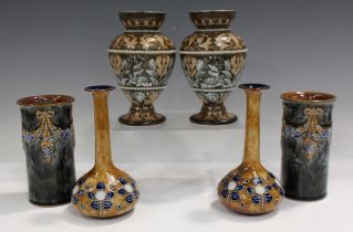 A pair of Royal Doulton stoneware vases, decorated by Eliza S. Banks, the bodies decorated with