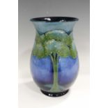 A Moorcroft Moonlit Blue pattern vase, circa 1925, impressed marks and painted signature to base,