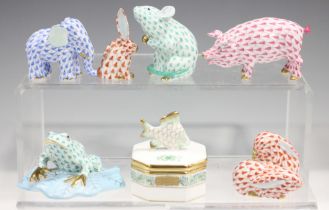 Six Herend porcelain animals in a variety of green, blue, pink and red scale patterns, comprising