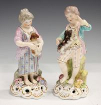 A pair of Stevenson & Hancock Derby porcelain figures, late 19th century, modelled as a girl and