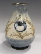A Moorcroft salt glazed Big Poppy pattern vase, 1920s, impressed marks and painted initials to base,