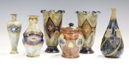 A near pair of Royal Doulton stoneware vases, first half 20th century, decorated with lozenge shaped