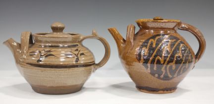 A studio pottery teapot and cover, probably by Clive Bowen, brown glazed with a black panel of