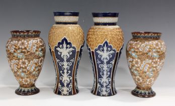 A pair of Doulton Lambeth stoneware vases, first half 20th century, each with scrolling foliate