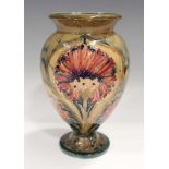 A Macintyre Moorcroft Revived Cornflower pattern vase, circa 1912-13, brown printed mark and green