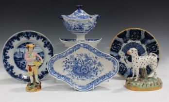 A pearlware blue printed two-handled sauce tureen and cover with integral stand, early 19th century,