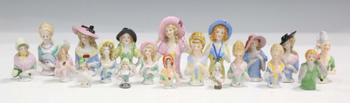 Twenty assorted cosy and pin cushion half-dolls, mostly early 20th century, length of largest 9cm,