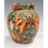A Moorcroft Flame of the Forest ginger jar and cover, circa 1997, designed by Phillip Gibson,