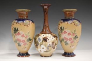 A pair of Royal Doulton stoneware vases, first half 20th century, decorated with pink and white