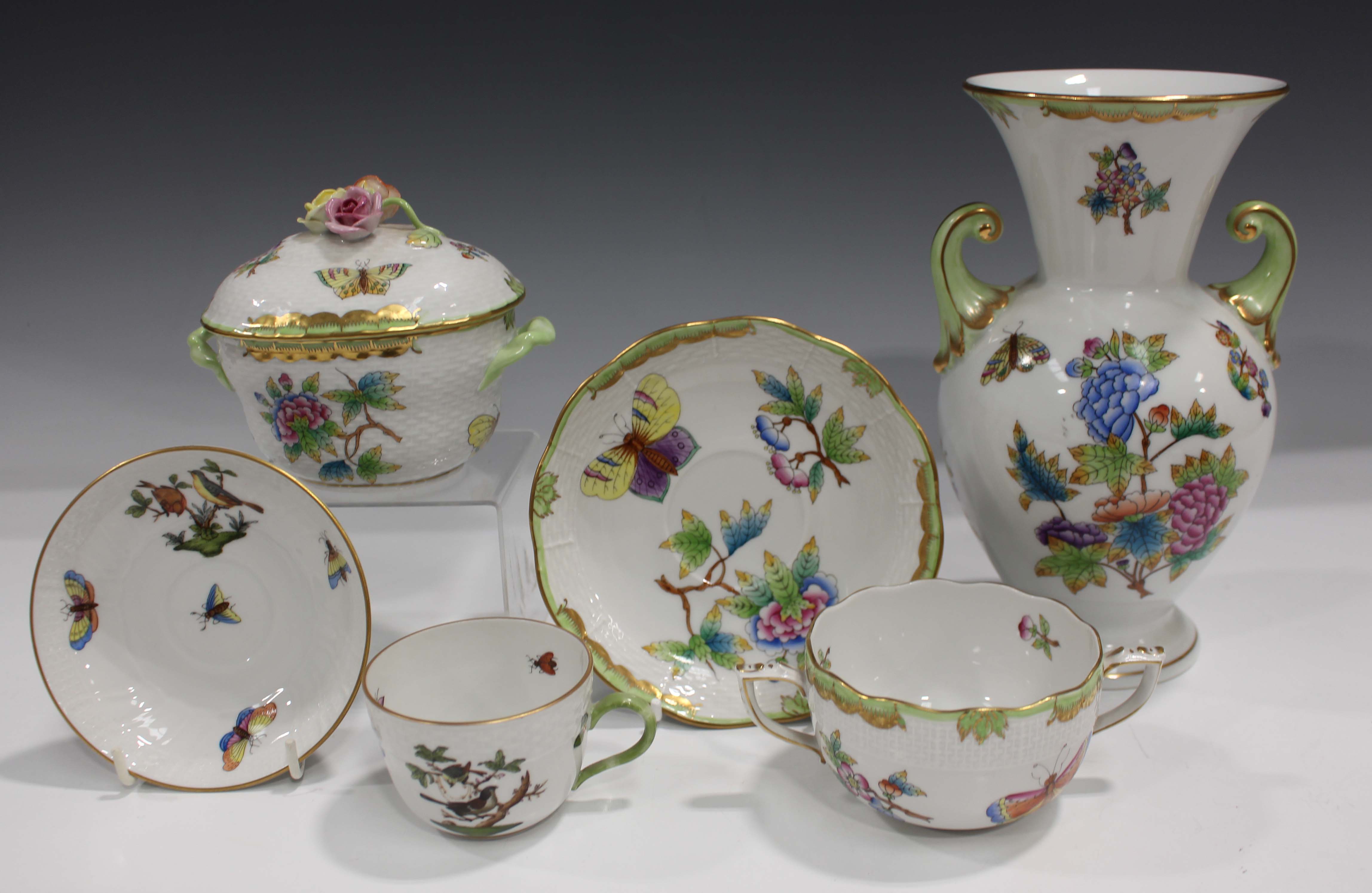 A small group of Herend porcelain, painted with butterflies and flowers in the Victoria pattern,