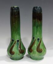 A pair of Belgian art pottery vases, late 19th/early 20th century, with bulbous bodies and