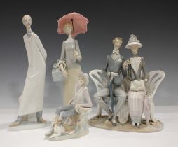 Four Lladro figures, comprising The Dressmaker, No. 4700, Lovers In The Park, No. 1274, Doctor,