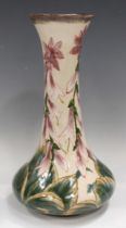 A Cobridge pottery vase, circa 1998, the low-bellied body decorated with stylized hostas,