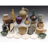 A collection of studio pottery, including three Kingwood Pottery dishes, each decorated with a