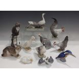 Twelve Royal Copenhagen porcelain animal models, including a lynx, designed by Peter Herold, No.