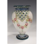 A Macintyre Moorcroft vase, circa 1907-1909, the baluster body decorated with swags of roses and