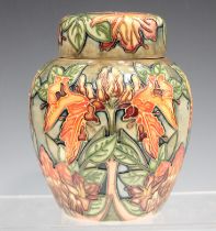 A Moorcroft Flame of the Forest pattern ginger jar and cover, dated 1999, designed by Philip Gibson,