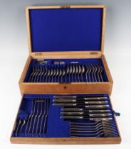 A Walker & Hall canteen of plated Old English pattern cutlery, comprising six table knives and