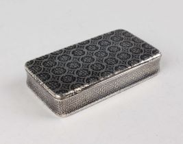 A 19th century French silver and niello rectangular snuff box, the hinged lid and base decorated