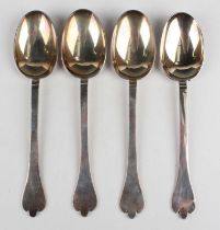A set of four Edwardian Britannia Standard silver Trefoil serving spoons, London 1906 by Thomas