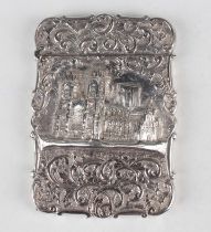 An early Victorian silver castle-top rectangular card case, decorated in relief with a view of