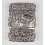 An early Victorian silver castle-top rectangular card case, decorated in relief with a view of