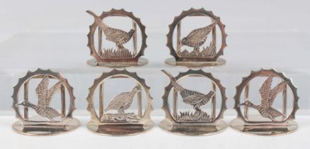 A set of six Elizabeth II silver menu holders, each pierced and engraved with a game bird within a