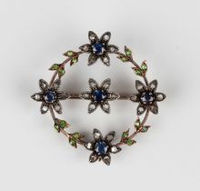 A demantoid garnet, rose cut diamond, sapphire and gem set brooch, of circular floral wreath design,