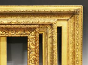 A 19th century gilt composition frame with foliate strapwork and corner crestings, rebate 32.5cm x
