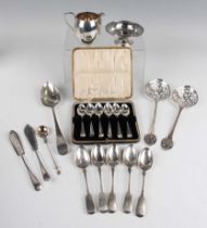 A group of silver, including a pair of Edwardian serving spoons, each with pierced bowl and matching