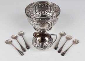 A late Victorian small silver circular rose bowl with reeded rim above embossed 'C' scroll and