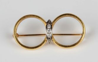 Two Swedish wedding rings, each detailed '23K', and the front of a diamond three stone ring, mounted