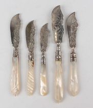 A Victorian silver and carved mother-of-pearl handled butter knife with engraved foliate decoration,