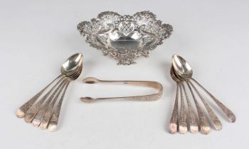 A set of eleven late Victorian Scottish silver teaspoons and pair of matching sugar tongs, each with