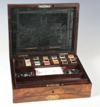 An early Victorian rosewood cased artist's box by James Newman of 24 Soho Square, the hinged lid